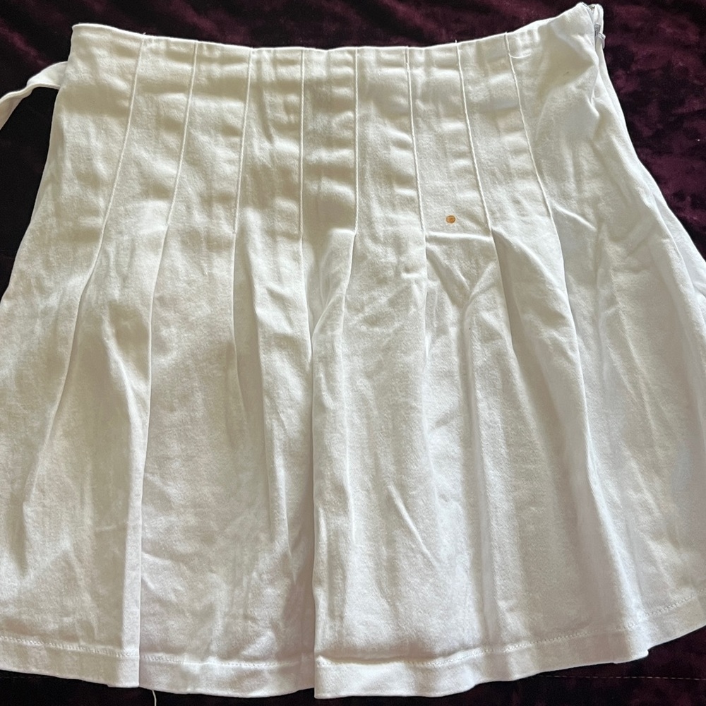 White pleated skirt